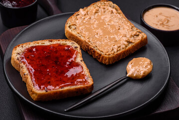 Nutritious sandwiches consisting of bread, raspberry jam and peanut butter