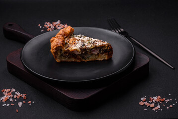 Delicious quiche with chicken, cheese, herbs, spices and herbs
