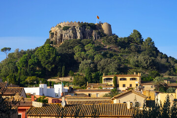 views to the Castell de Begur on top of a hill in the middle of the old town Begur in Catalonia, view over the roofs, Costa Brava, Girona, Catalonia, Spain - obrazy, fototapety, plakaty