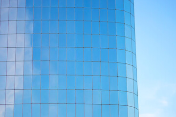 glass facade of the building against the sky