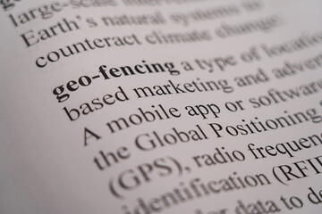 Fototapeta premium A closeup mockup of a dictionary of the word Geo-Fencing