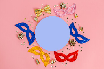 Multicolored carnival mask on blue background. Purim.