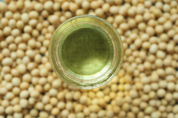 close up of Raw soy bean seed oil in a container 