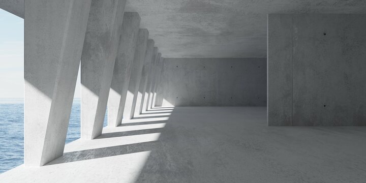Abstract large, empty, modern concrete room with row of sloped pillars, divider wall, rough floor and view to the outside with ocean and sky background on the left