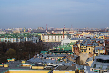 Roofs of houses, historical buildings, urban architecture.