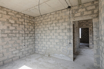 Construction of an individual residential building, wall view with a doorway