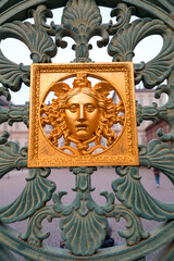 Gold colored bas relief decoration