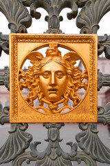 Gold colored bas relief decoration