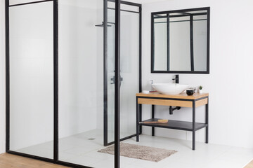 Minimalist modern bathroom with shower cabin
