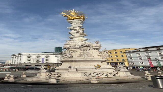 Hauptplatz with municipal building and trinity column in Linz, Austria
