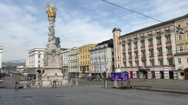 Hauptplatz with municipal building and trinity column in Linz, Austria