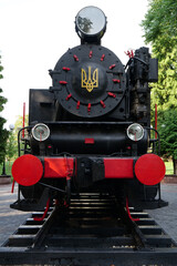 Old steam locomotive near railway station in Ivano-Frankivsk, Ukraine