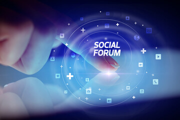 Finger touching tablet with social media icons concept