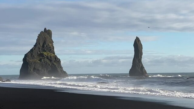 Reynisdrangar basalt sea stacks at Reynisfjara black sand beach. Near Vik, Iceland. Southern point on the Ring Road. 