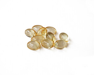 Vitamin D. Omega 3 Supplement. Fish oil capsules isolated on white background. Pharmaceuticals pills medicine and healthcare concept.                              