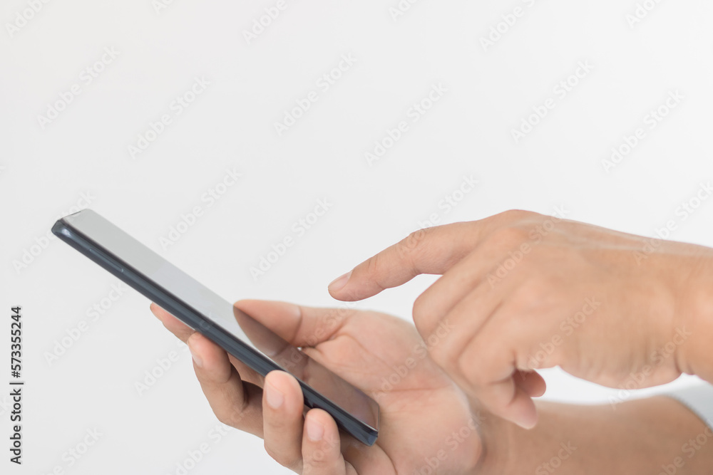 Aufkleber close-up of a man using a mobile smartphone. isolated hands and smartphone on white background.