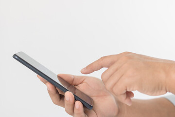 Close-up of a man using a mobile smartphone. Isolated hands and smartphone on white background.