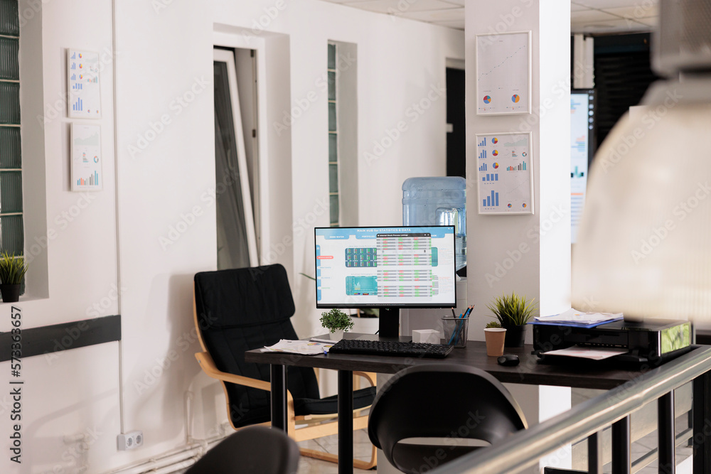 Poster empty office before the start of the working day, stock market investment software on the desktop co