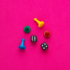 Board game pieces and dice - Rhodamine red eva rubber background
