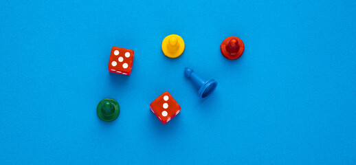 Board game pieces and dice - Blue eva rubber background