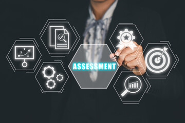 Assessment analysis Business analytics evaluation measure technology concept, Business person hand touching assessment icon on virtual screen.