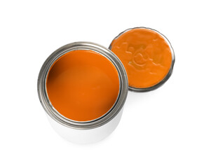Can and lid with orange paint on white background, above view