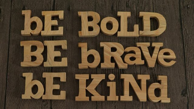 Be bold brave kind, text words typography written with wooden letter, life and business motivational inspirational