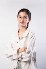 Happy young Asian woman presenting or showing open hand palm with copy space for product isolated on white background