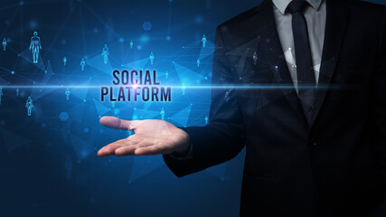 Hand holding social media related inscription