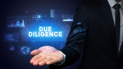 Hand of Businessman holding motivational message