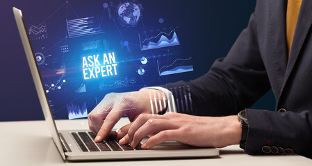 Businessman working on laptop, business concept