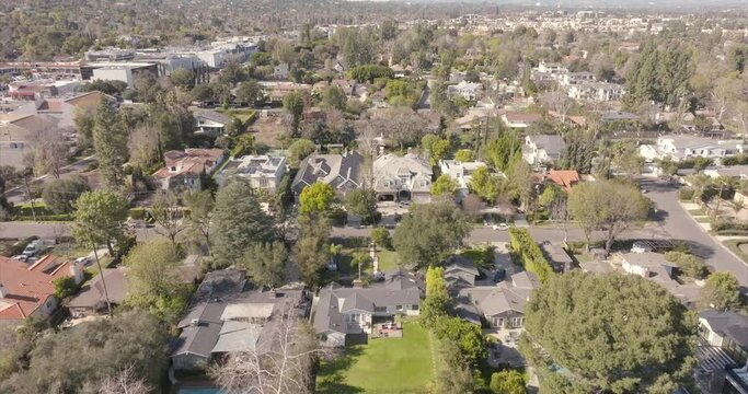 Million dollar Encino Los Angeles expensive property aerial view over scenic affluent residential neighbourhood suburb