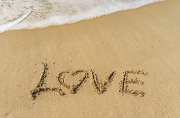 Love write in the sand