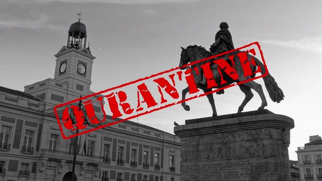 Red old stamp text quarantine animation on Madrid Spain puerta del sol (door of the Sun) city
