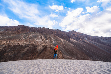 Happy Girl Travel at sand dune in Nubra valley, Leh Ladakh, india.