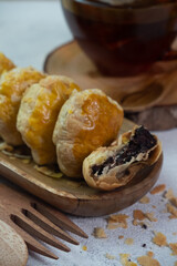 selective focus on crispy dry bakpia snacks usually served with hot tea suitable for eating when breaking the fast in the month of Ramadan. soft focus