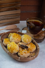 selective focus on crispy dry bakpia snacks usually served with hot tea suitable for eating when breaking the fast in the month of Ramadan. soft focus