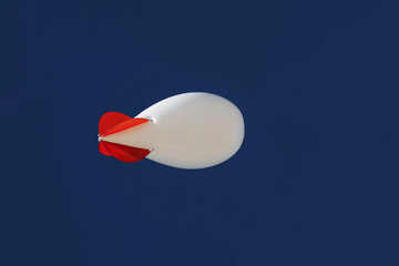 Reconnaissance balloon in the sky. Elements of this image furnished by NASA