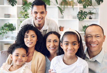 Family in happy portrait with kids, parents and grandparents on sofa with smile in home in Brazil. Happiness, generations of men and women with children, people spending time together making memories