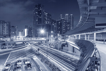 Fototapeta na wymiar Traffic and skyline of downtown of Hong Kong city at night