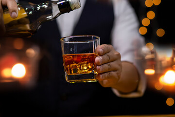 Bartender Serve Whiskey, on wood bar, 