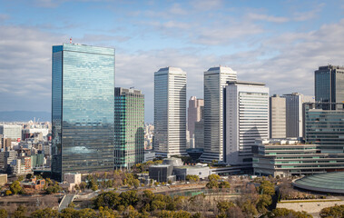 Fototapeta na wymiar Osaka Japan city skyline downtown building skycrapers view on a cloudy day