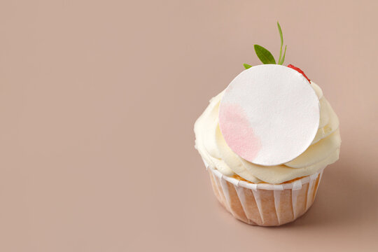 Sweet Cupcake with cream and label place, mock up, logo, template for advertising. Text space.