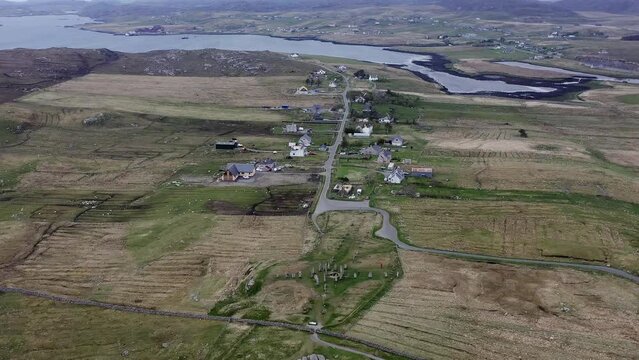 Birds-eye-view drone shot of the Callanish Standing Stones. Filmed on the Isle of Lewis, part of the Outer Hebrides of Scotland.