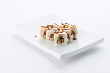 Sushi set and composition at white background. Japanese food restaurant, sushi maki gunkan roll plate or platter set.