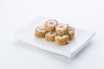 Sushi set and composition at white background. Japanese food restaurant, sushi maki gunkan roll plate or platter set.