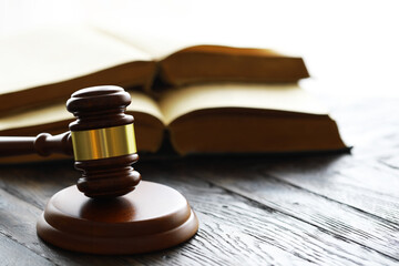 Judges gavel on wooden desk. Law firm concept.