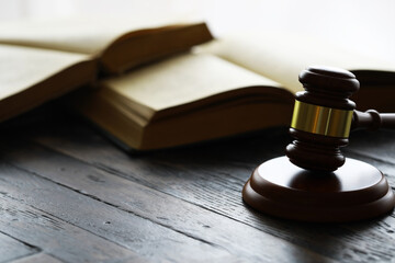Judges gavel on wooden desk. Law firm concept.