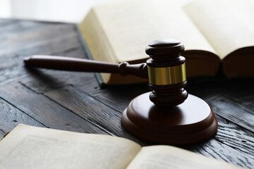 Judges gavel on wooden desk. Law firm concept.