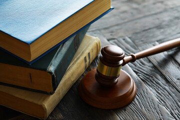 Judges gavel on wooden desk. Law firm concept.